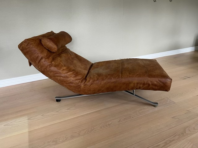 Before and after of a reupholstered sofa